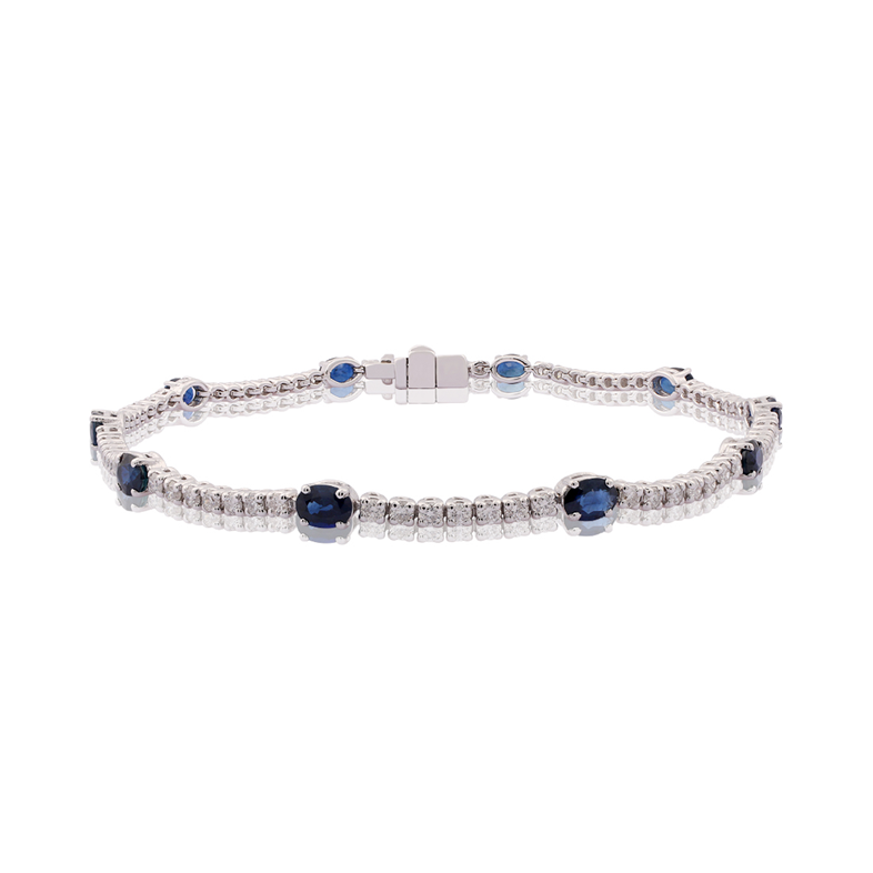 18k white gold blue sapphires and diamonds bracelet.